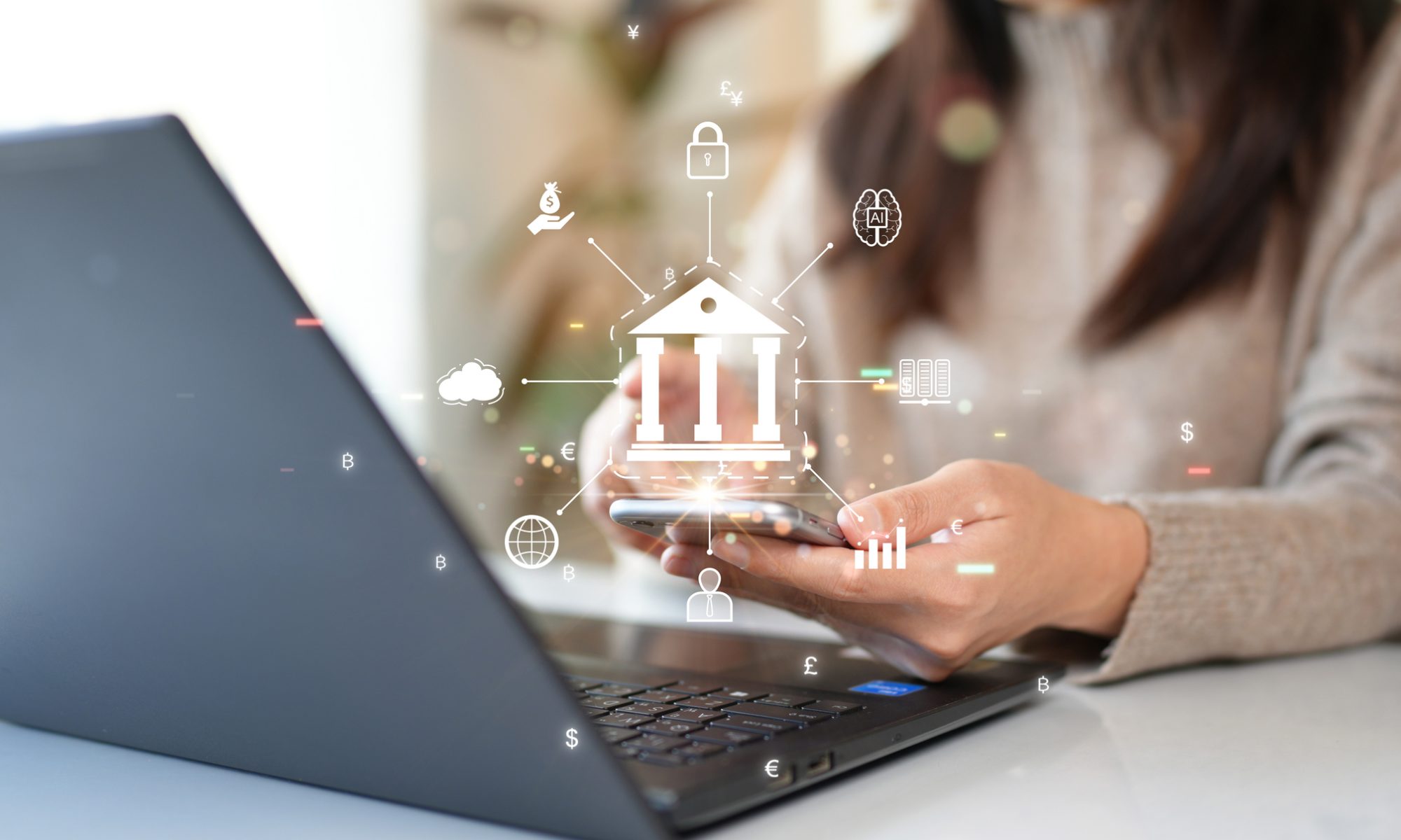 A person uses a smartphone and laptop simultaneously, surrounded by digital financial and data icons, symbolizing fintech and policy technology.