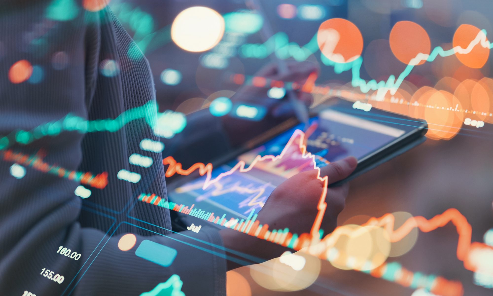 Investor reviewing real-time stock market data on a tablet, with digital price charts and trading indicators highlighting biotech and medical device sector momentum.