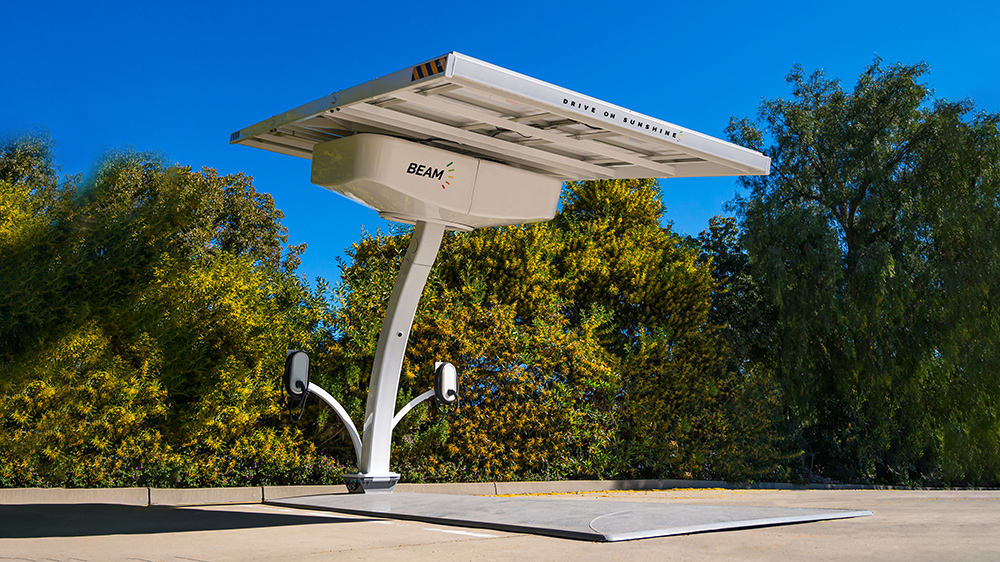 Solar-powered EV ARC charging system by Beam Global installed outdoors, featuring an elevated solar canopy and integrated EV chargers.