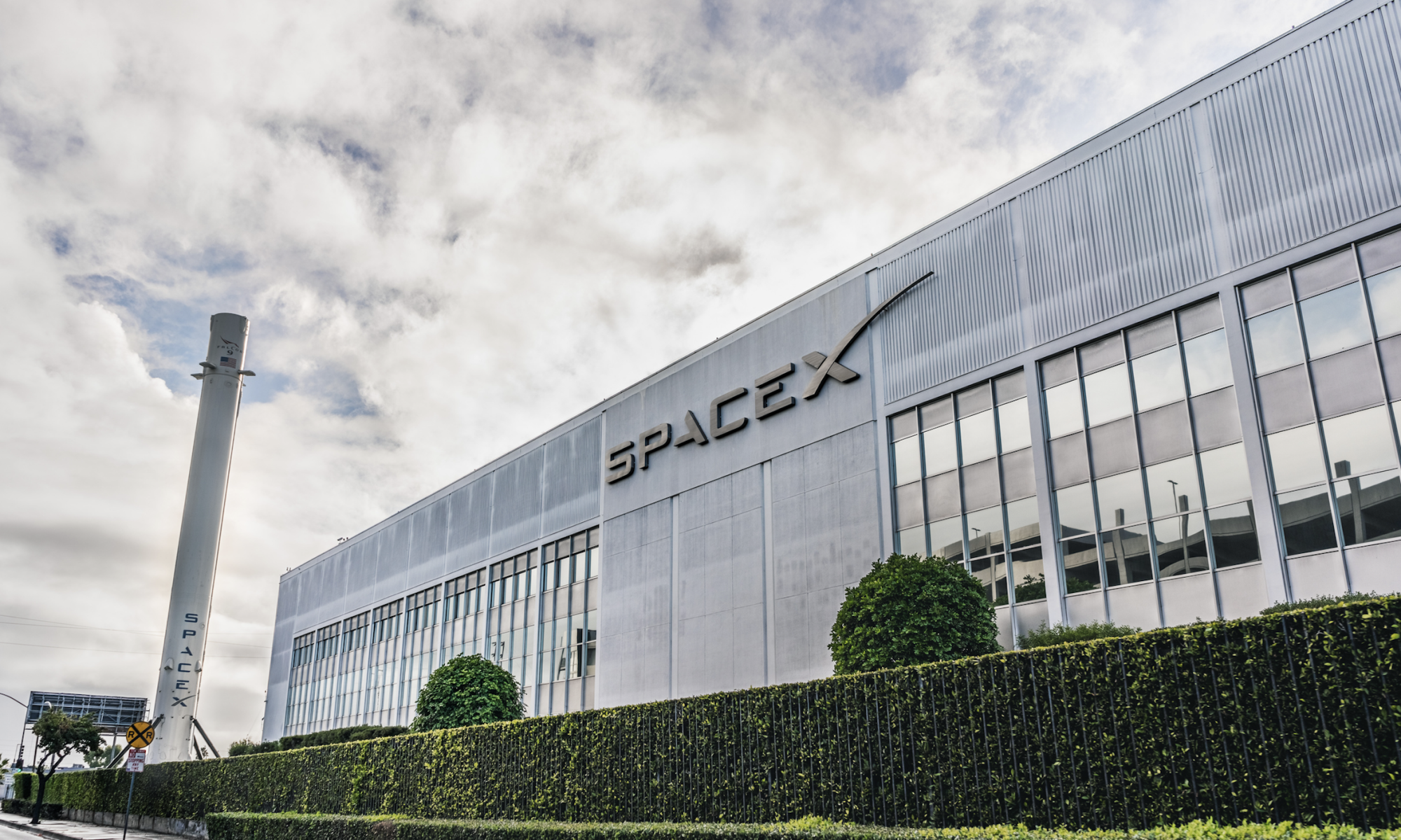 SpaceX's Nasdaq-100 inclusion just 15 days after its IPO forces index funds to buy in — here's how the fast-track move reaches your 401(k) and portfolio.