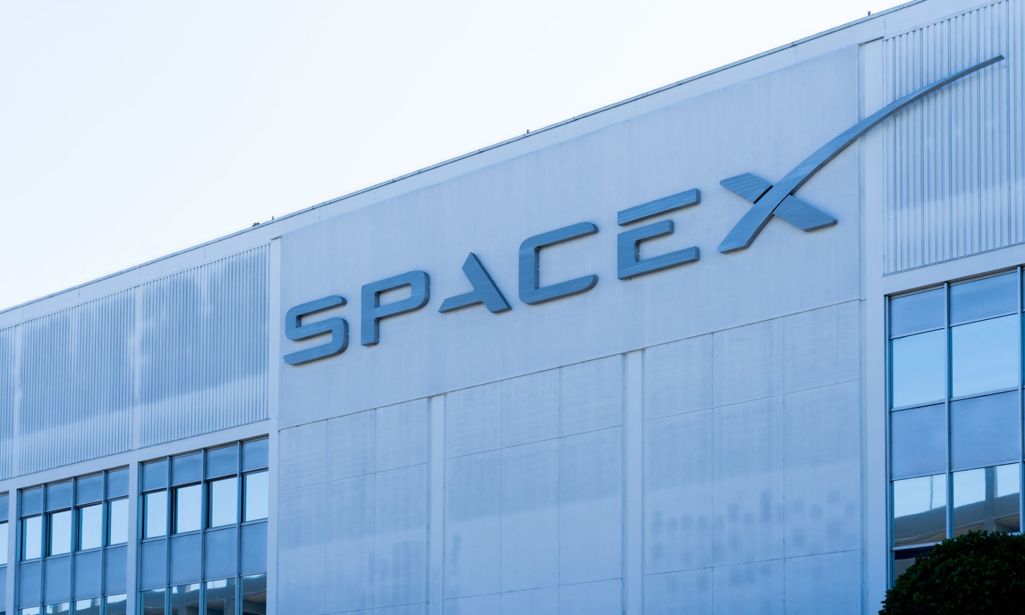 SpaceX posts its first earnings Aug 4 with revenue near $6.9B. Two days later, a $100 billion share lock-up unlocks. What investors should watch on the call.