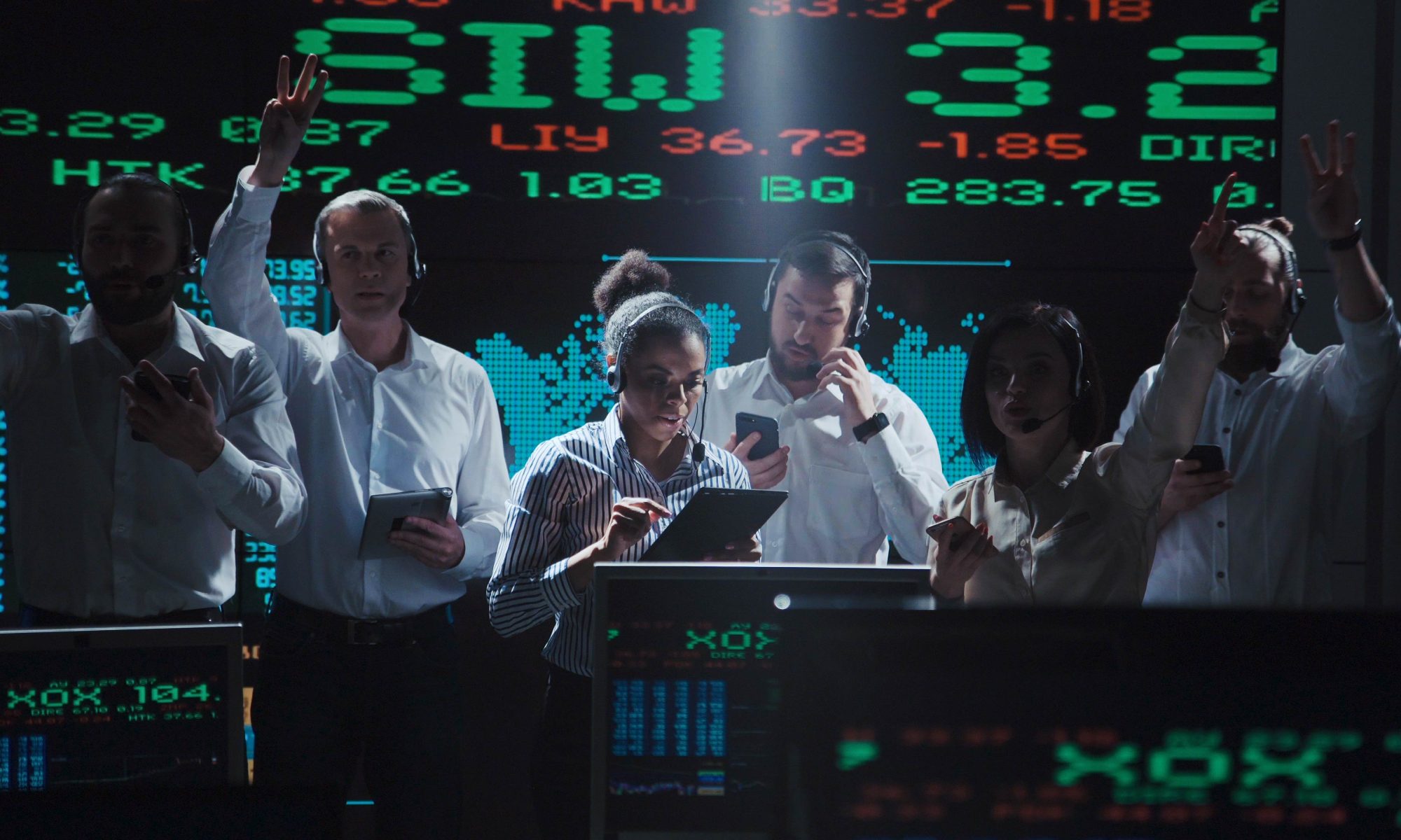 Stock market traders monitor fast-moving financial data and market activity, representing PRISM Mid-Day Movers led by PubMatic and AgEagle Aerial Systems.
