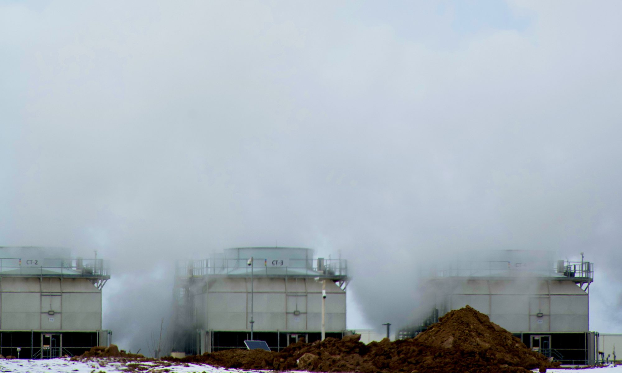 Large-scale power generation facility with steam rising from industrial equipment, representing Babcock & Wilcox’s 1 GW steam turbine program with Siemens Energy for AI data centers and other power-intensive projects.