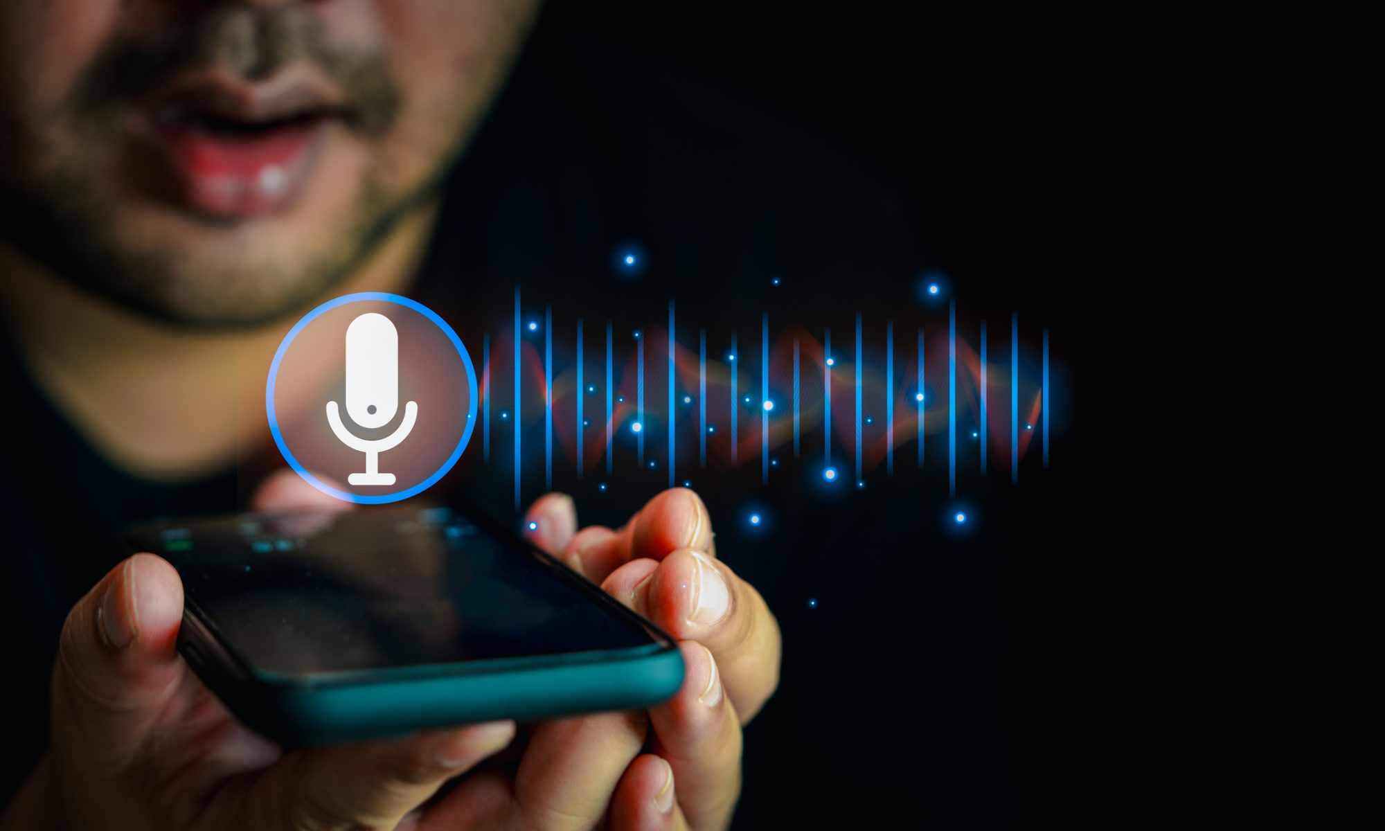 Person using a smartphone with a digital microphone and audio waveform, representing Rekor Systems’ GoSecure technology for cryptographically verifying recorded audio and detecting alterations.