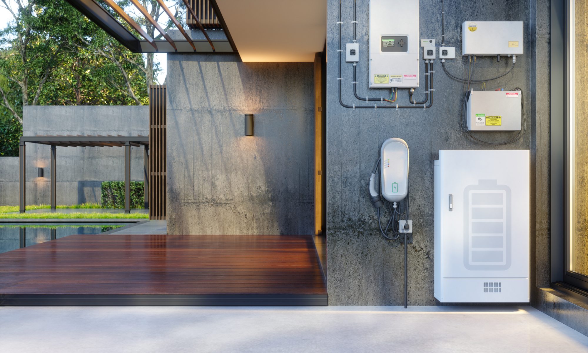 Modern residential battery energy-storage system with wall-mounted power equipment and an EV charger installed outside a contemporary home.