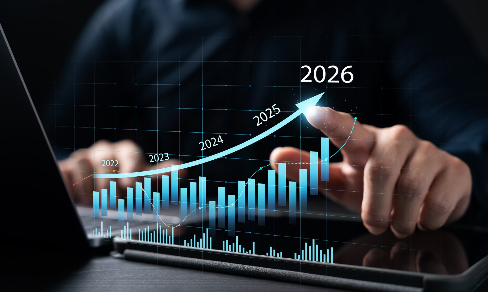 Business professional interacting with a digital growth chart showing an upward trajectory toward 2026, representing Roadzen’s record revenue growth and improving operating performance.