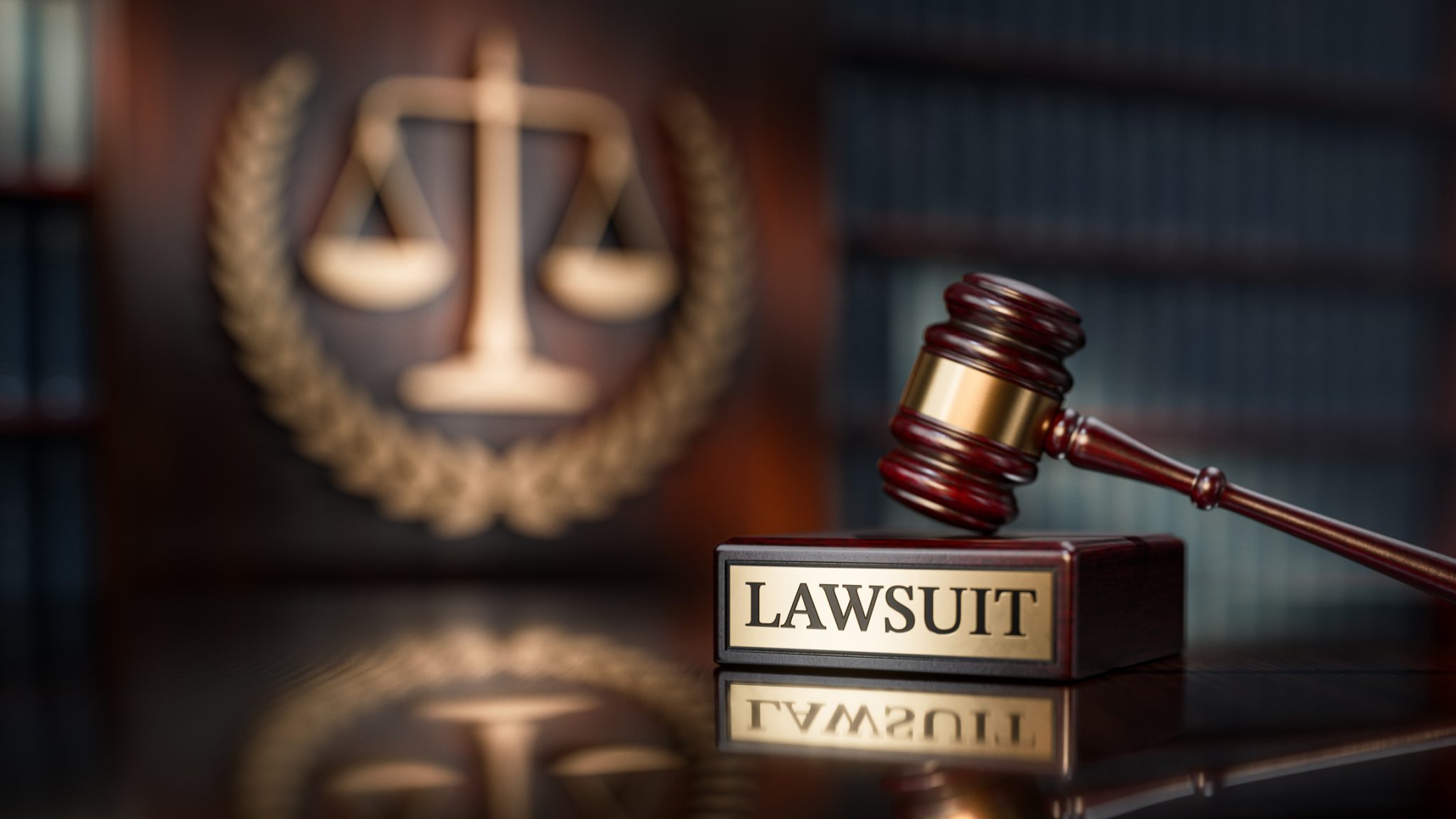 Judge’s gavel beside a “Lawsuit” plaque and scales of justice, representing Better Home & Finance’s federal lawsuit against former CEO Vishal Garg.