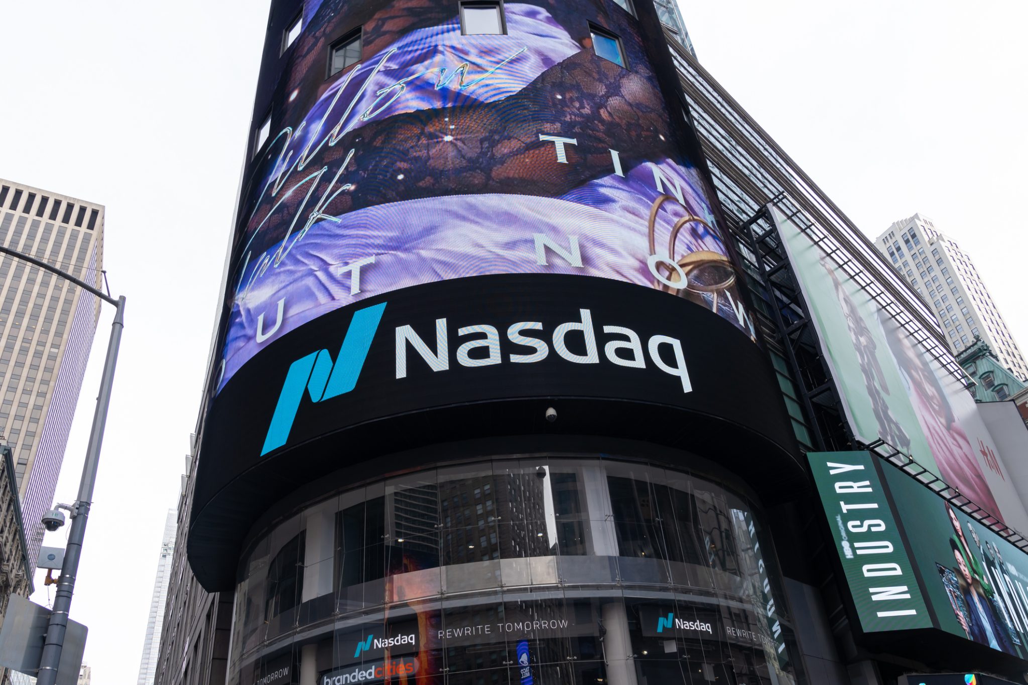 Nasdaq MarketSite in Times Square, representing Trio-Tech International’s planned move to the Nasdaq Global Market under ticker TRT.