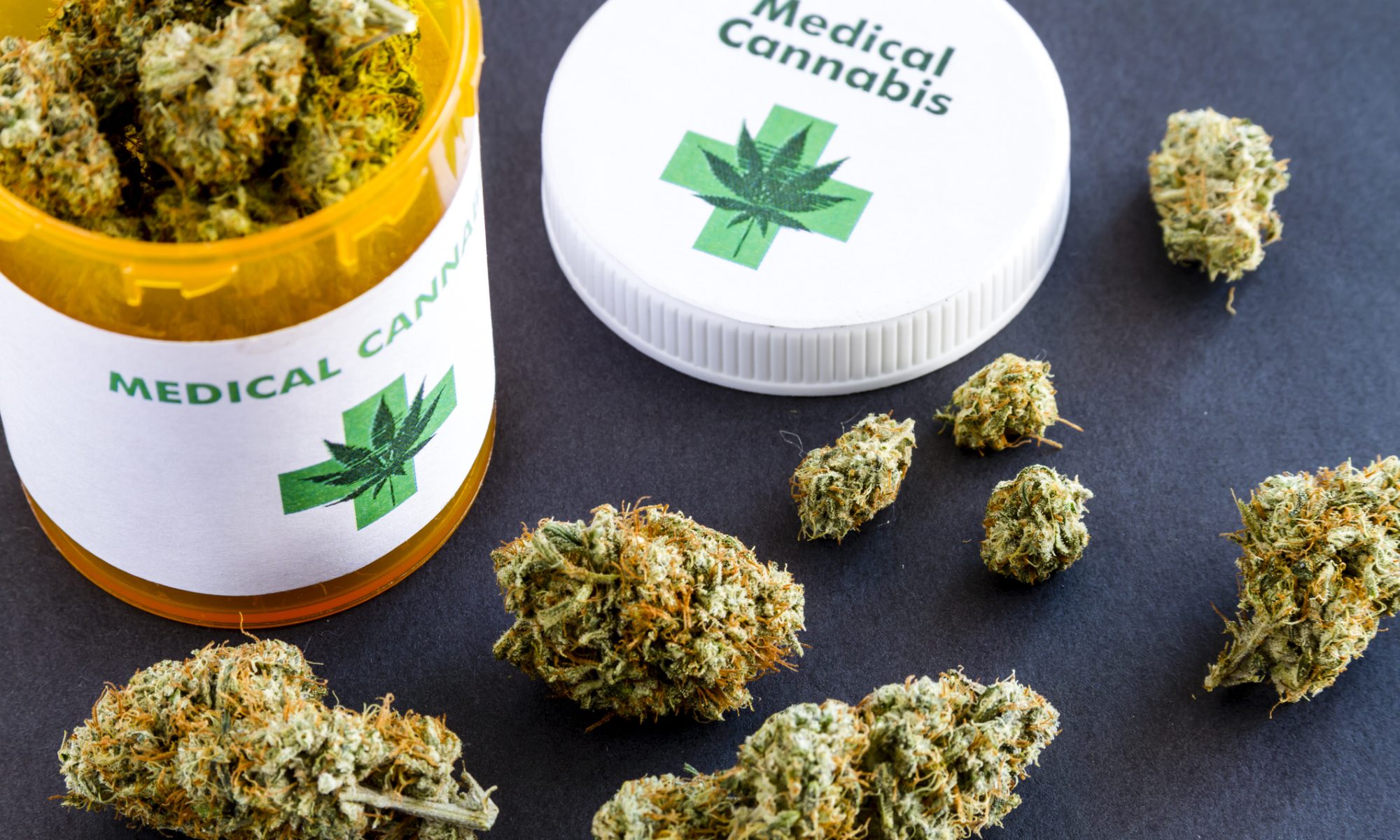 Medical cannabis flower beside a prescription-style container, representing Aurora Cannabis’ expansion of its U.K. medical cannabis distribution network.