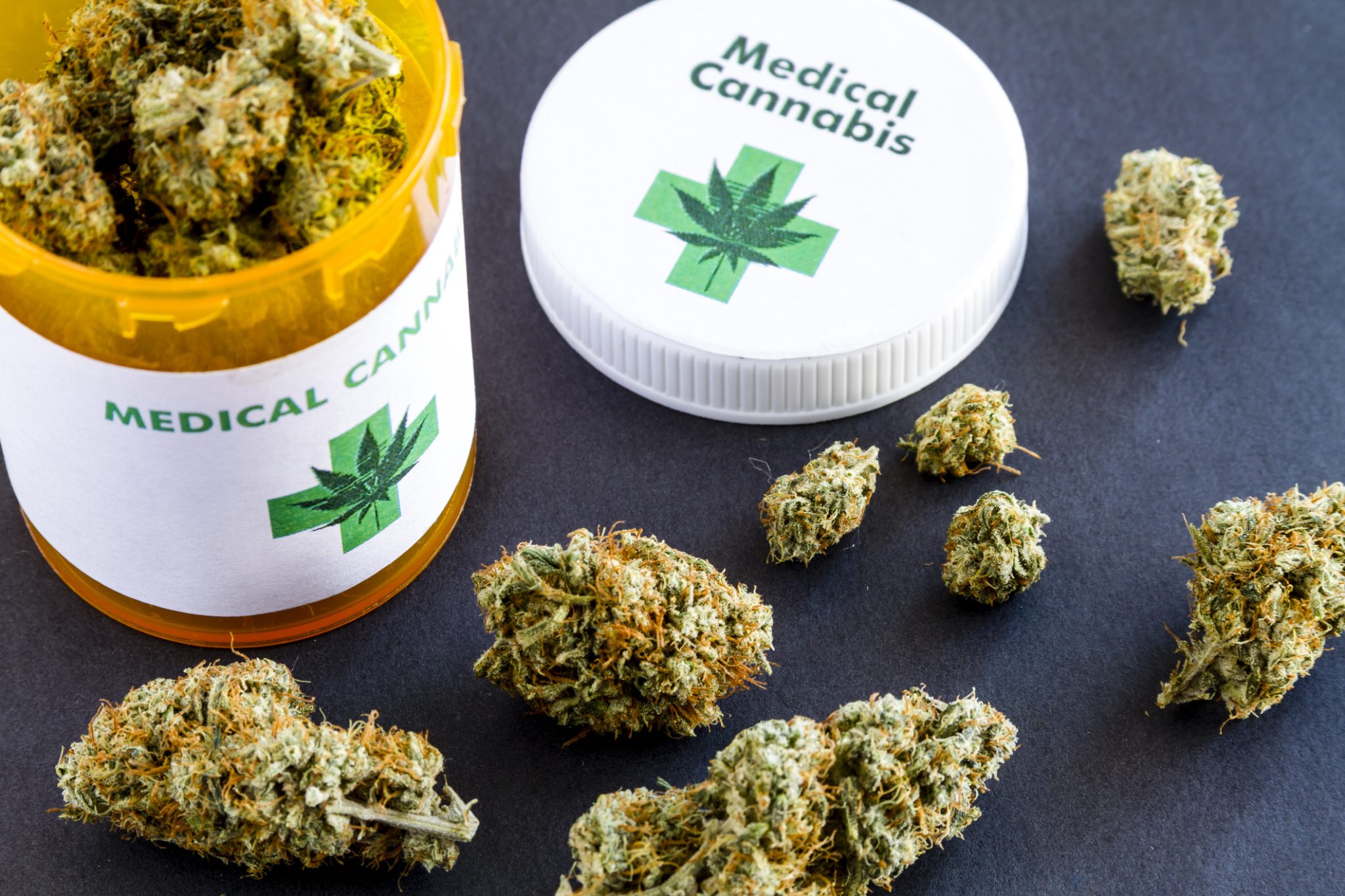 Medical cannabis flower beside a prescription-style container, representing Aurora Cannabis’ expansion of its U.K. medical cannabis distribution network.