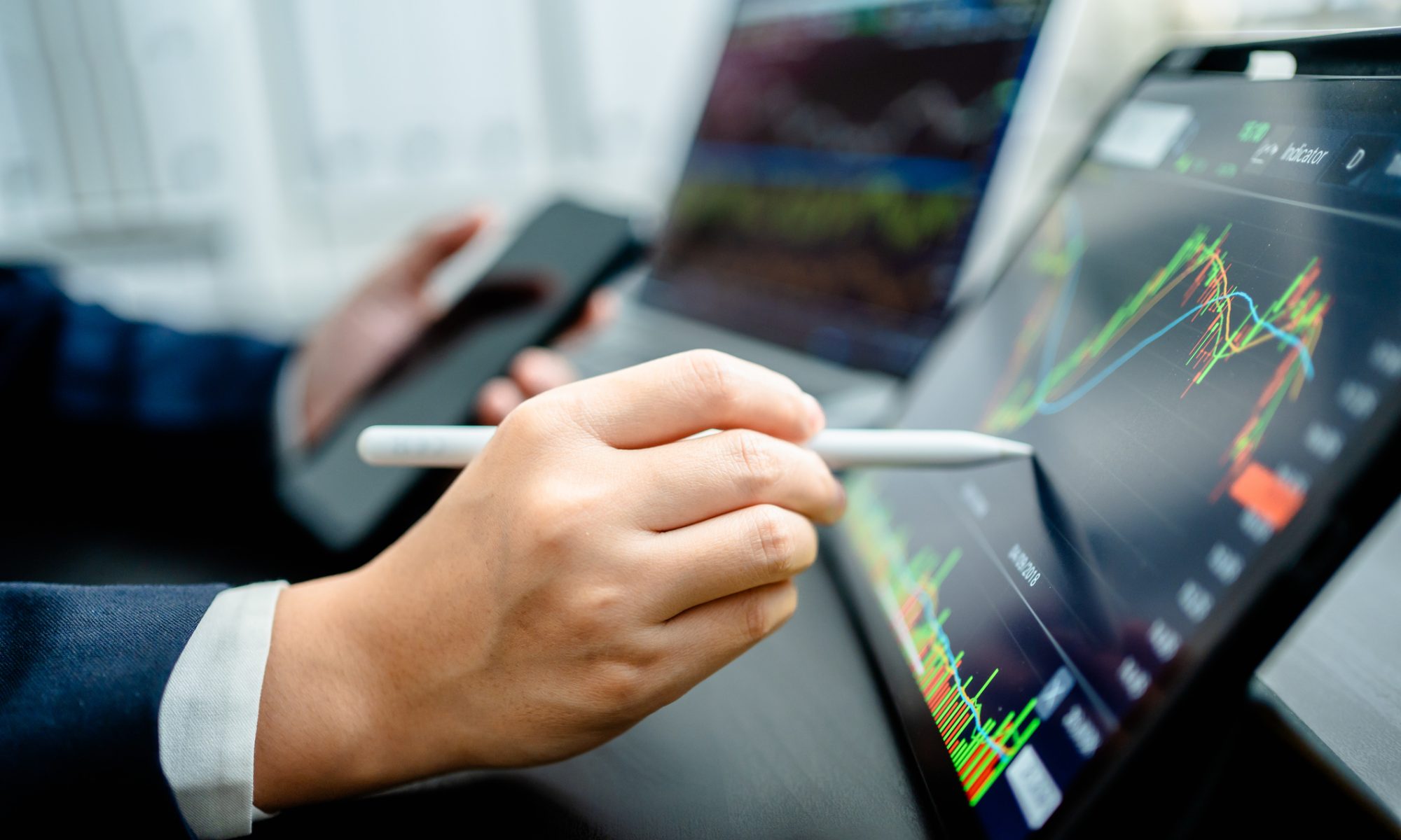 Investor analyzing stock charts on a digital trading screen, illustrating sharp mid-day moves in crypto mining, sports, clean energy, biotech, and quantum stocks.