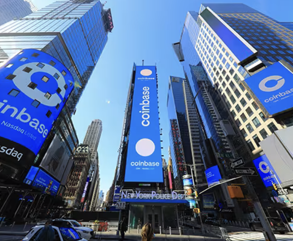 Coinbase stock (NASDAQ: COIN) rose 8.2% to $186.49 as Bitcoin surged 22% past $71,000. Record 10.3% volume share meets a $988M loss. Both sides, explained.