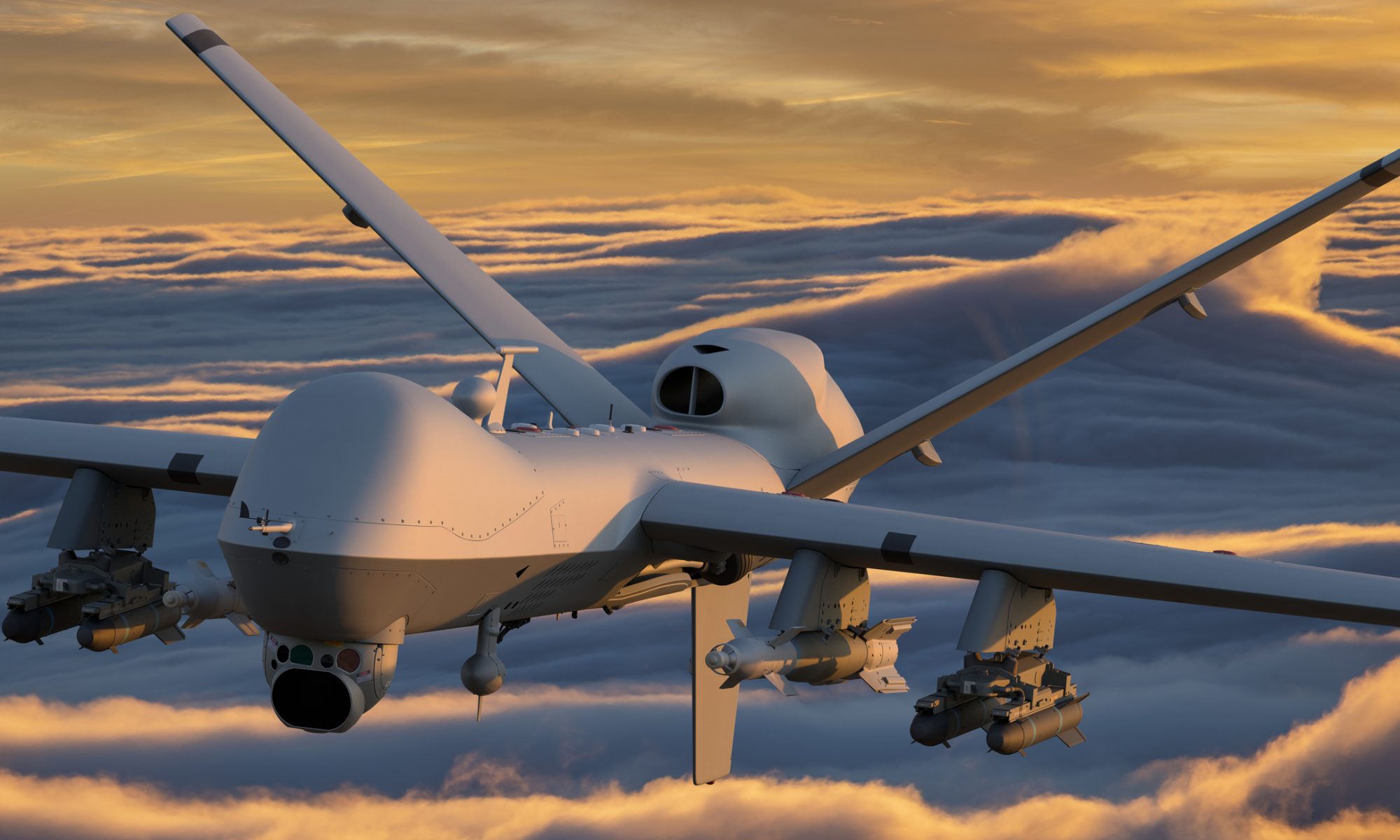 Military-style unmanned aerial vehicle flying above the clouds, representing GCT Semiconductor’s new UAV control and wireless communications partnership.