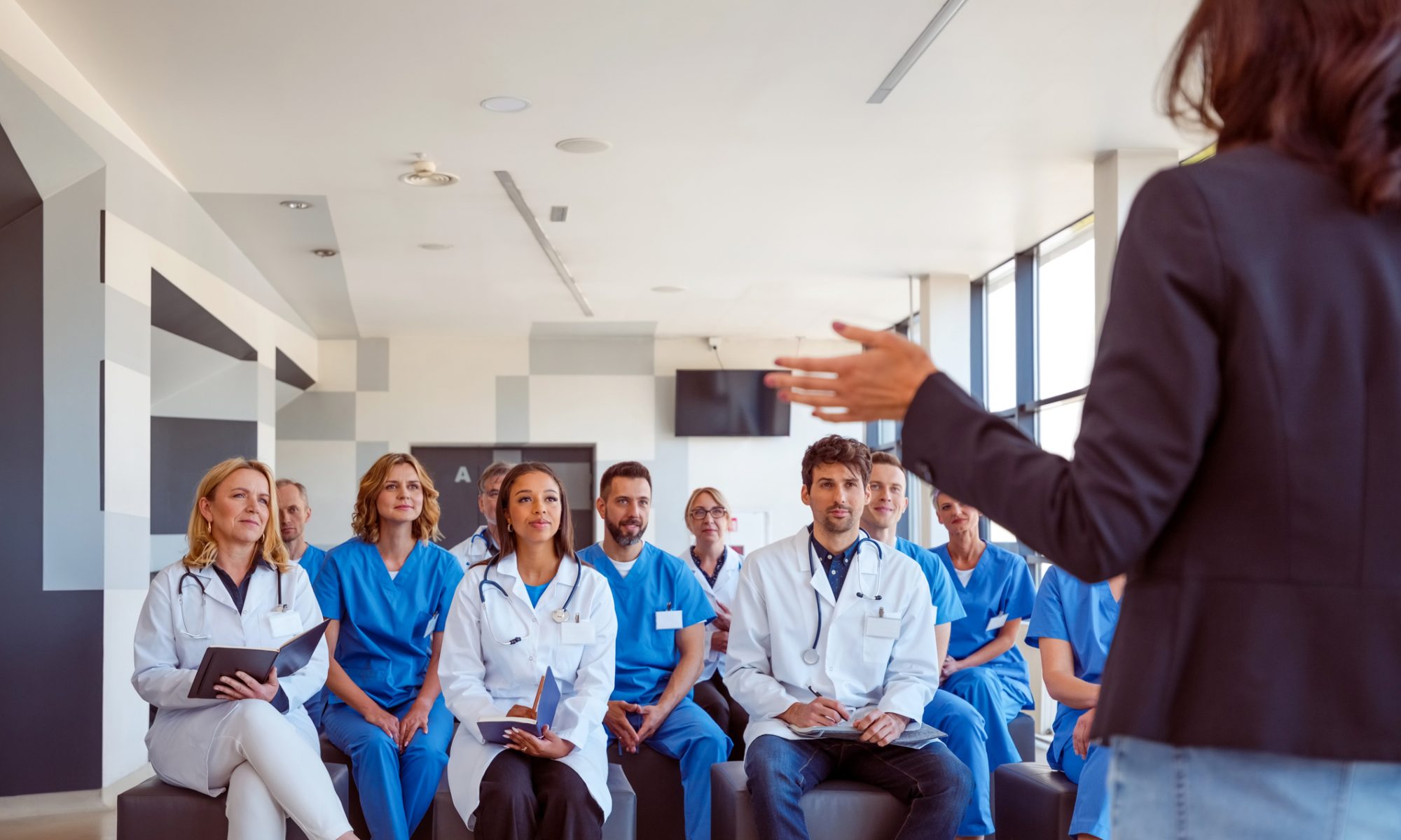 Healthcare professionals attending an educational presentation, representing Compass Pathways’ treatment-resistant depression campaign at Psych Congress 2026.