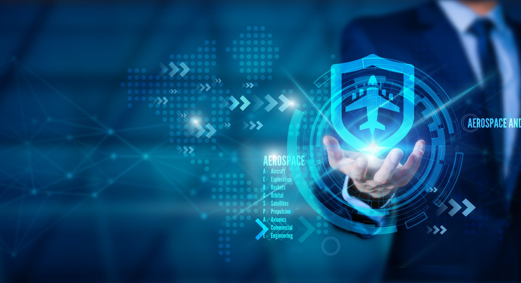 Business professional holding a digital aerospace and defense shield icon featuring an aircraft, with futuristic blue technology graphics and global network connections.